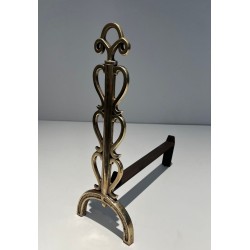 Pair of Brass and Wrought Iron Andirons with Stacked Heart-Lobe Uprights in the Manner of Raymond Subes. France. Circa 1940.