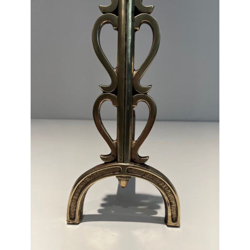 Pair of Brass and Wrought Iron Andirons with Stacked Heart-Lobe Uprights in the Manner of Raymond Subes. France. Circa 1940.