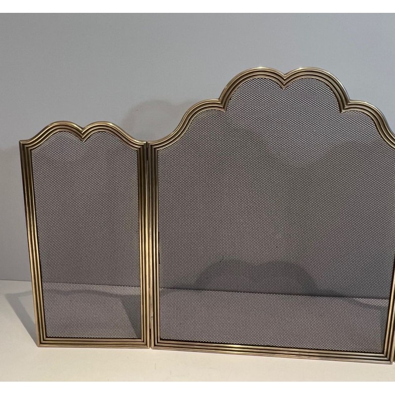 Three-Panel Neoclassical Brass and Wire Mesh Folding Fireplace Screen with Scalloped Crest Rail. France. Circa 1970.