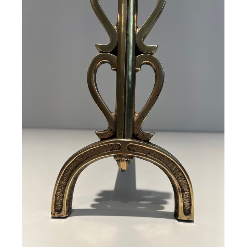 Pair of Brass and Wrought Iron Andirons with Stacked Heart-Lobe Uprights in the Manner of Raymond Subes. France. Circa 1940.