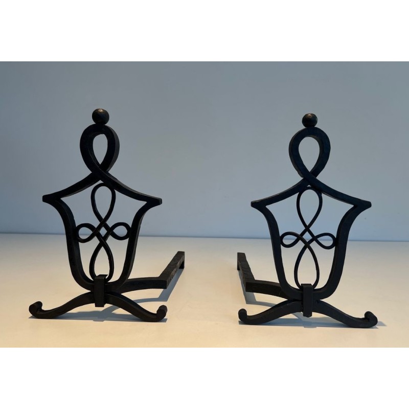 Pair of Wrought Iron Andirons with Interlaced Latticework Uprights in the Manner of Raymond Subes. France. Circa 1940.