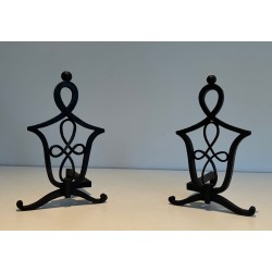 Pair of Wrought Iron Andirons with Interlaced Latticework Uprights in the Manner of Raymond Subes. France. Circa 1940.