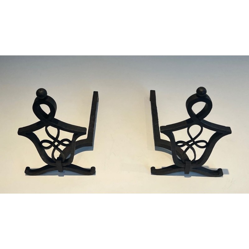 Pair of Wrought Iron Andirons with Interlaced Latticework Uprights in the Manner of Raymond Subes. France. Circa 1940.