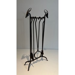 Nécessaire de Feu Moderniste en Fer Forgé à Têtes de Cerfs Stylisées. France. Vers 1940.