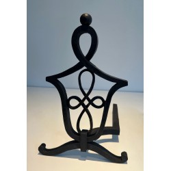 Pair of Wrought Iron Andirons with Interlaced Latticework Uprights in the Manner of Raymond Subes. France. Circa 1940.