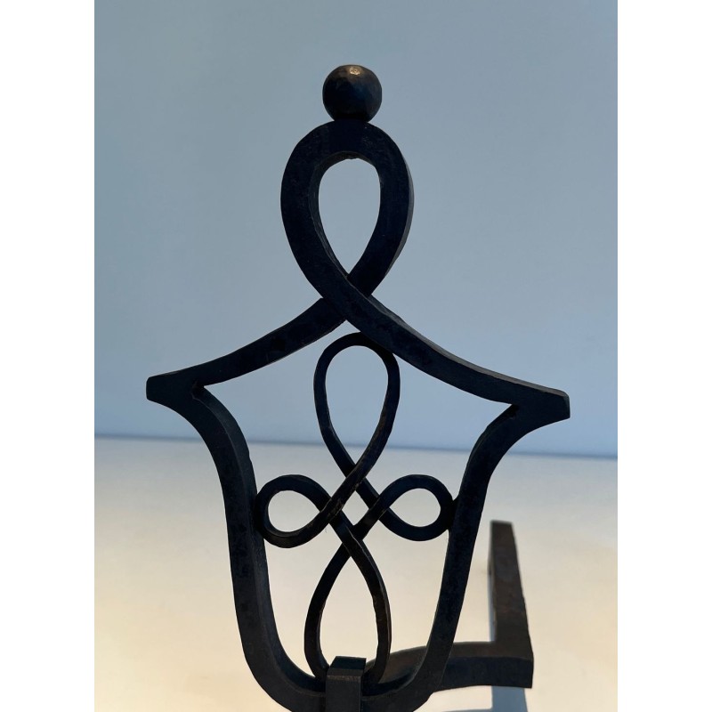Pair of Wrought Iron Andirons with Interlaced Latticework Uprights in the Manner of Raymond Subes. France. Circa 1940.