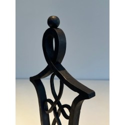 Pair of Wrought Iron Andirons with Interlaced Latticework Uprights in the Manner of Raymond Subes. France. Circa 1940.