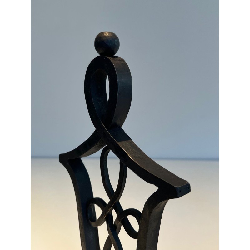 Pair of Wrought Iron Andirons with Interlaced Latticework Uprights in the Manner of Raymond Subes. France. Circa 1940.