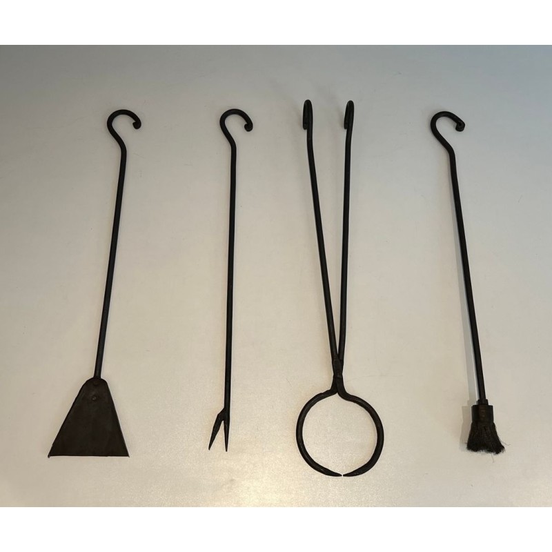 Modernist Wrought Iron Fireplace Companion Set with Stylized Deer Head Finials. France. Circa 1940.