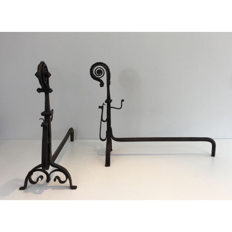 Monumental Pair of Wrought Iron Andirons with Snail-Shell Spiral Finials and Spit-Rest Arms. France. Circa 1900.