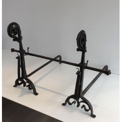 Monumental Pair of Wrought Iron Andirons with Snail-Shell Spiral Finials and Spit-Rest Arms. France. Circa 1900.