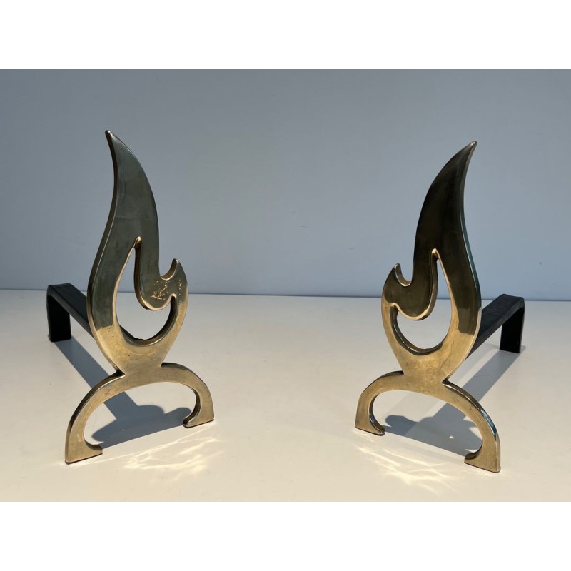 Pair of Brass Andirons with Cut-Out Flame Uprights. France. Circa 1920.