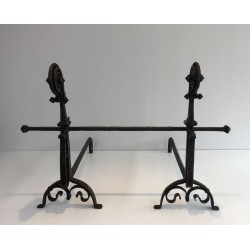 Monumental Pair of Wrought Iron Andirons with Snail-Shell Spiral Finials and Spit-Rest Arms. France. Circa 1900.
