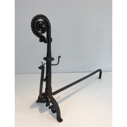 Monumental Pair of Wrought Iron Andirons with Snail-Shell Spiral Finials and Spit-Rest Arms. France. Circa 1900.