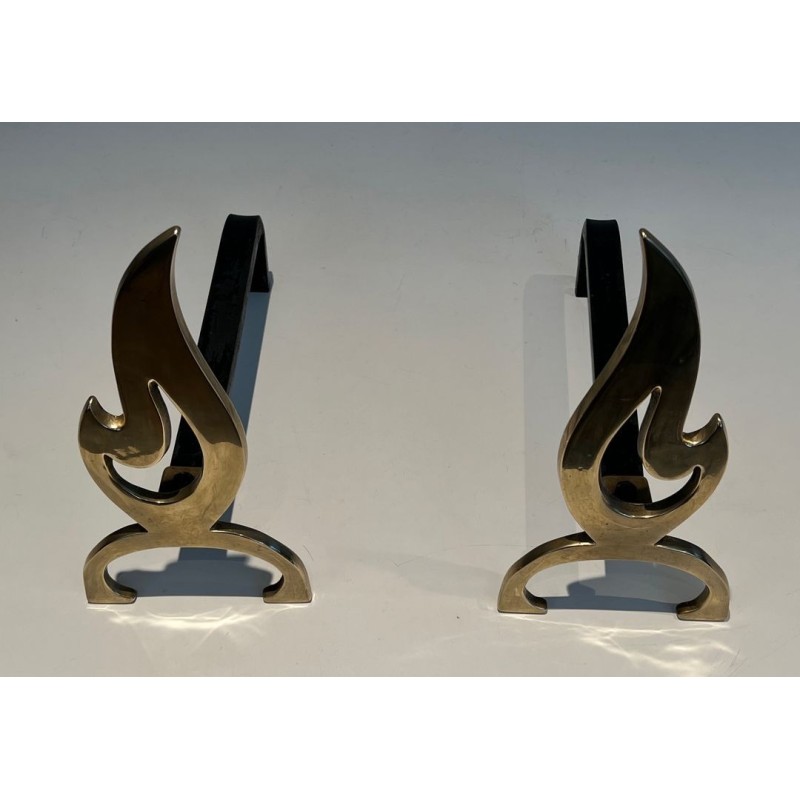 Pair of Brass Andirons with Cut-Out Flame Uprights. France. Circa 1920.