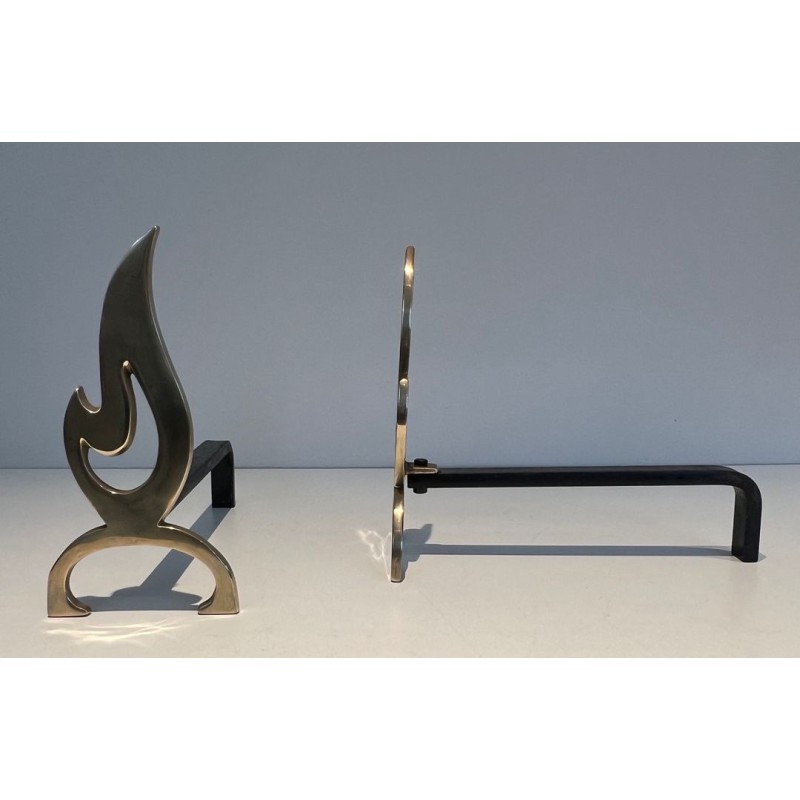 Pair of Brass Andirons with Cut-Out Flame Uprights. France. Circa 1920.