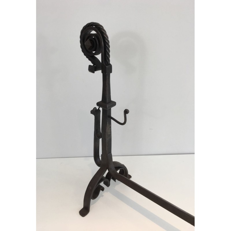 Monumental Pair of Wrought Iron Andirons with Snail-Shell Spiral Finials and Spit-Rest Arms. France. Circa 1900.