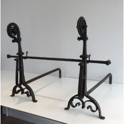 Monumental Pair of Wrought Iron Andirons with Snail-Shell Spiral Finials and Spit-Rest Arms. France. Circa 1900.