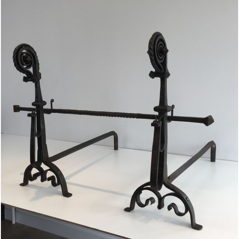 Monumental Pair of Wrought Iron Andirons with Snail-Shell Spiral Finials and Spit-Rest Arms. France. Circa 1900.