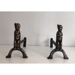 Pair of Bronze Andirons with Seated Shaman Figures, Monogrammed Anton Prinner. France. Circa 1930.