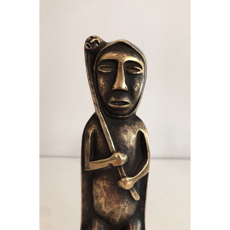 Pair of Bronze Andirons with Seated Shaman Figures, Monogrammed Anton Prinner. France. Circa 1930.