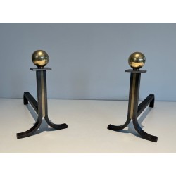 Pair of Modernist Steel and Brass Ball-Finial Andirons in the Manner of Jacques Adnet. France. Circa 1940.