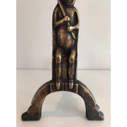 Pair of Bronze Andirons with Seated Shaman Figures, Monogrammed Anton Prinner. France. Circa 1930.