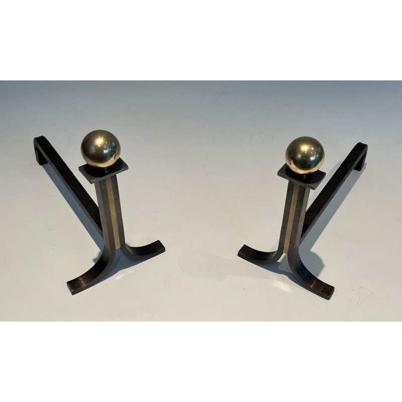 Pair of Modernist Steel and Brass Ball-Finial Andirons in the Manner of Jacques Adnet. France. Circa 1940.