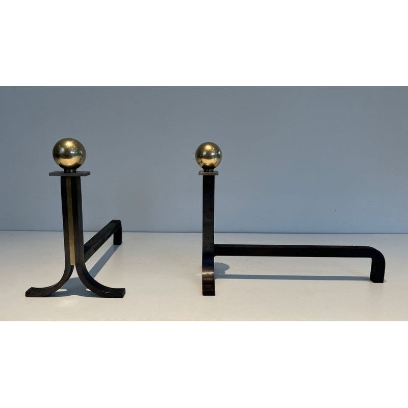 Pair of Modernist Steel and Brass Ball-Finial Andirons in the Manner of Jacques Adnet. France. Circa 1940.
