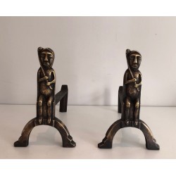 Pair of Bronze Andirons with Seated Shaman Figures, Monogrammed Anton Prinner. France. Circa 1930.