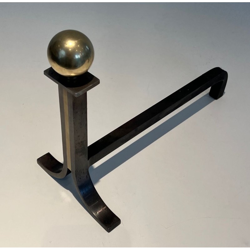 Pair of Modernist Steel and Brass Ball-Finial Andirons in the Manner of Jacques Adnet. France. Circa 1940.