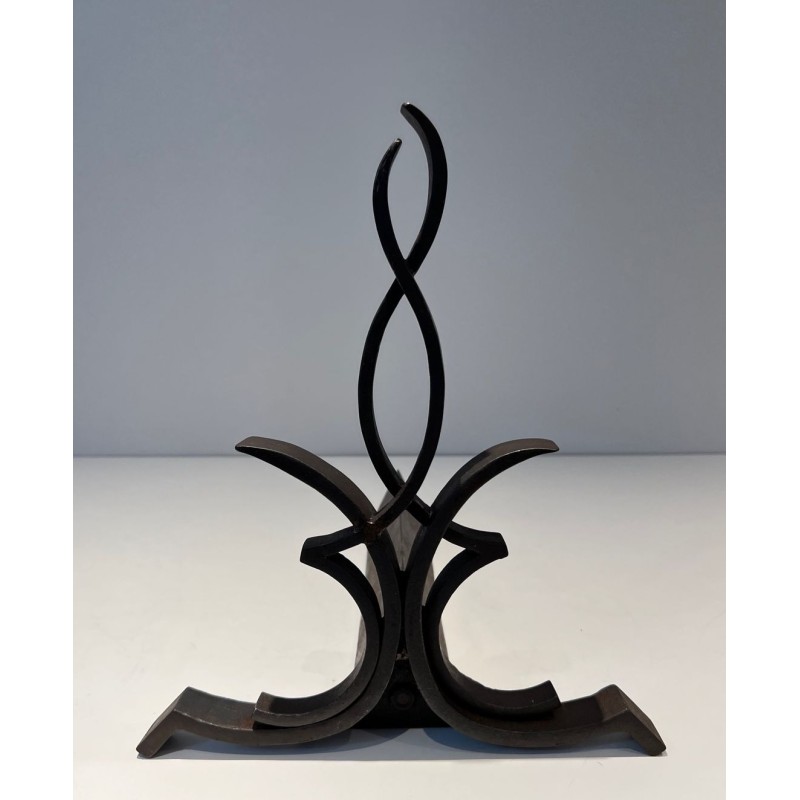 Pair of Wrought Iron Andirons with Figure-Eight Loop Uprights and Scrolled Foliate Feet by Raymond Subes. France. Circa 1940.