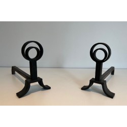 Pair of Modernist Cast Iron and Wrought Iron Andirons with Open-Ring Finials in the Manner of Jacques Adnet. France. Circa 1940.
