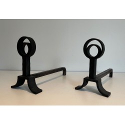 Pair of Modernist Cast Iron and Wrought Iron Andirons with Open-Ring Finials in the Manner of Jacques Adnet. France. Circa 1940.