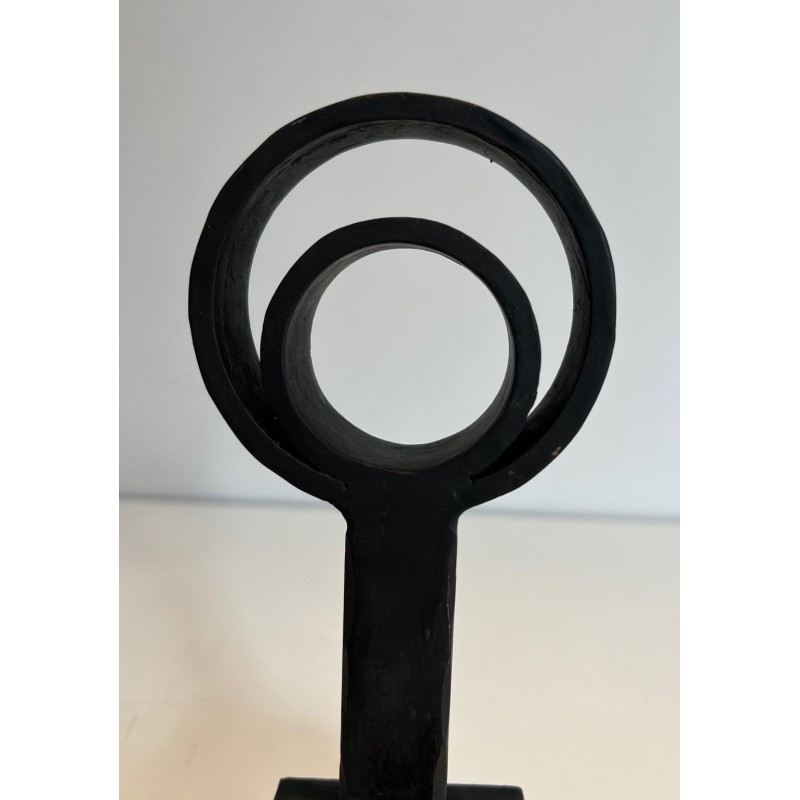 Pair of Modernist Cast Iron and Wrought Iron Andirons with Open-Ring Finials in the Manner of Jacques Adnet. France. Circa 1940.