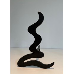 Pair of Modernist Steel Andirons with Sinuous Wave-Cut Silhouette. France. Circa 1970.