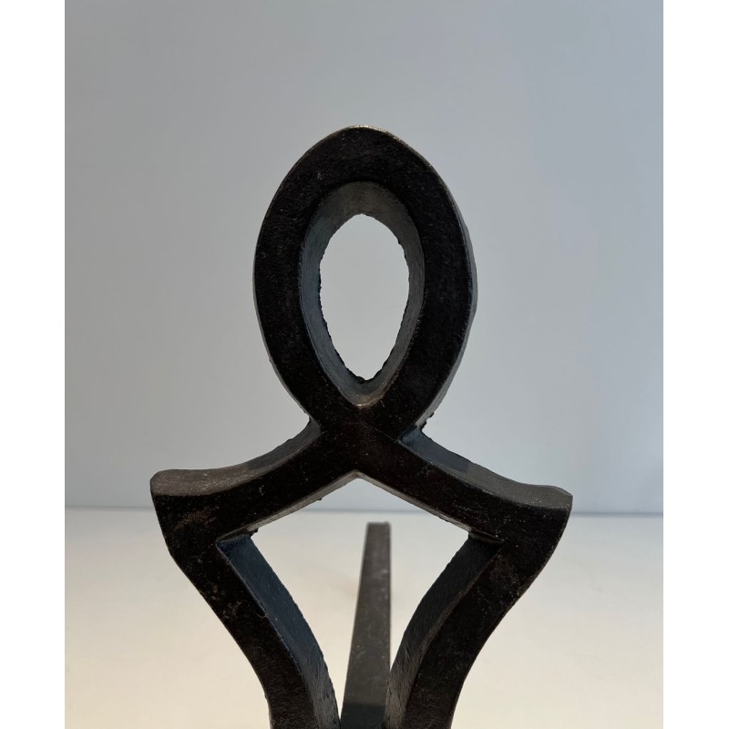 Pair of Wrought Iron Andirons with Oval Loop Finials and Hourglass Uprights by Raymond Subes. France. Circa 1940.