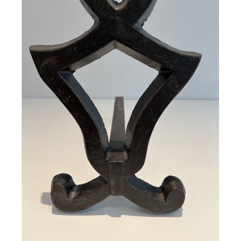 Pair of Wrought Iron Andirons with Oval Loop Finials and Hourglass Uprights by Raymond Subes. France. Circa 1940.