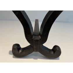 Pair of Wrought Iron Andirons with Oval Loop Finials and Hourglass Uprights by Raymond Subes. France. Circa 1940.