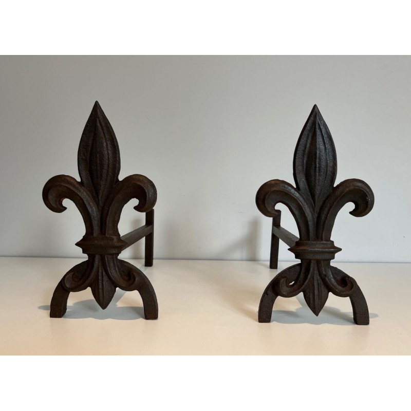 Pair of Cast Iron Andirons with Fleur-de-Lys Finials. France. Circa 1970.