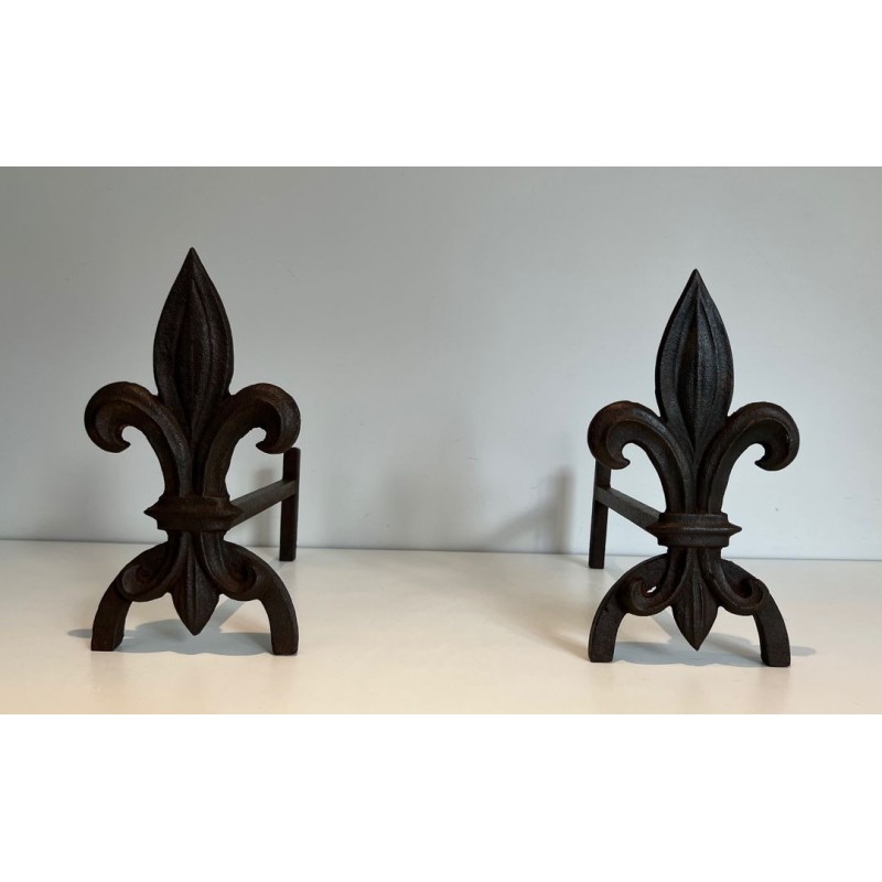 Pair of Cast Iron Andirons with Fleur-de-Lys Finials. France. Circa 1970.