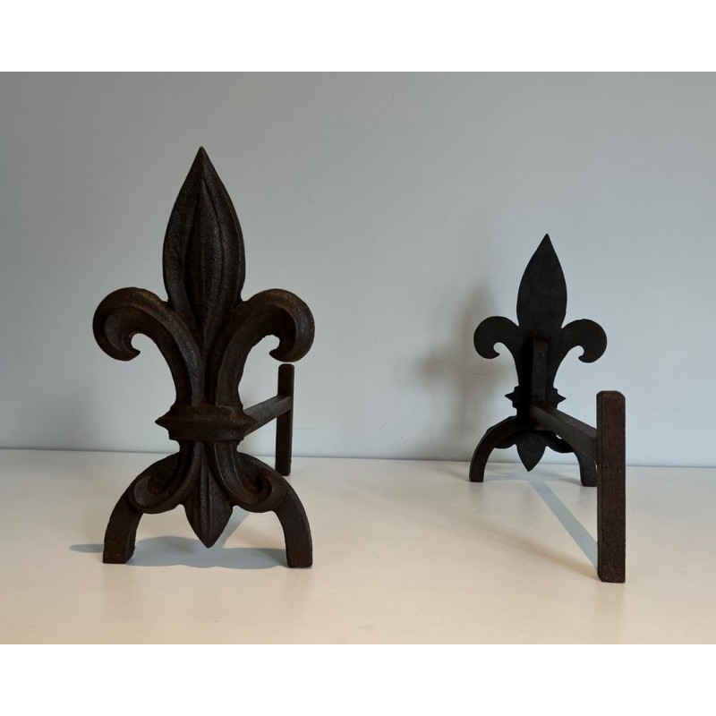Pair of Cast Iron Andirons with Fleur-de-Lys Finials. France. Circa 1970.