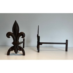 Pair of Cast Iron Andirons with Fleur-de-Lys Finials. France. Circa 1970.