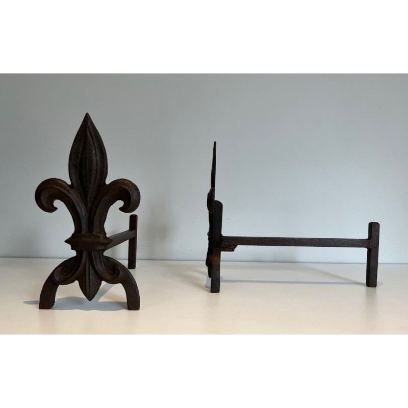 Pair of Cast Iron Andirons with Fleur-de-Lys Finials. France. Circa 1970.