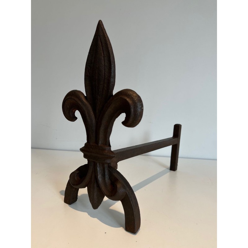 Pair of Cast Iron Andirons with Fleur-de-Lys Finials. France. Circa 1970.
