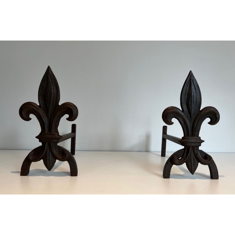 Pair of Cast Iron Andirons with Fleur-de-Lys Finials. France. Circa 1970.