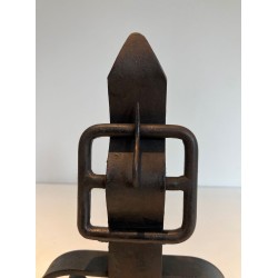 Pair of Wrought Iron Andirons with Flame Finials and Strap-Buckle Midsection. France. Circa 1950.