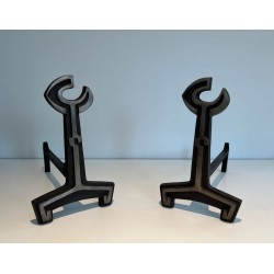 Pair of Modernist Cast Iron Andirons with Open-Ring Finials. France. Circa 1950.
