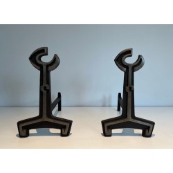 Pair of Modernist Cast Iron Andirons with Open-Ring Finials. France. Circa 1950.