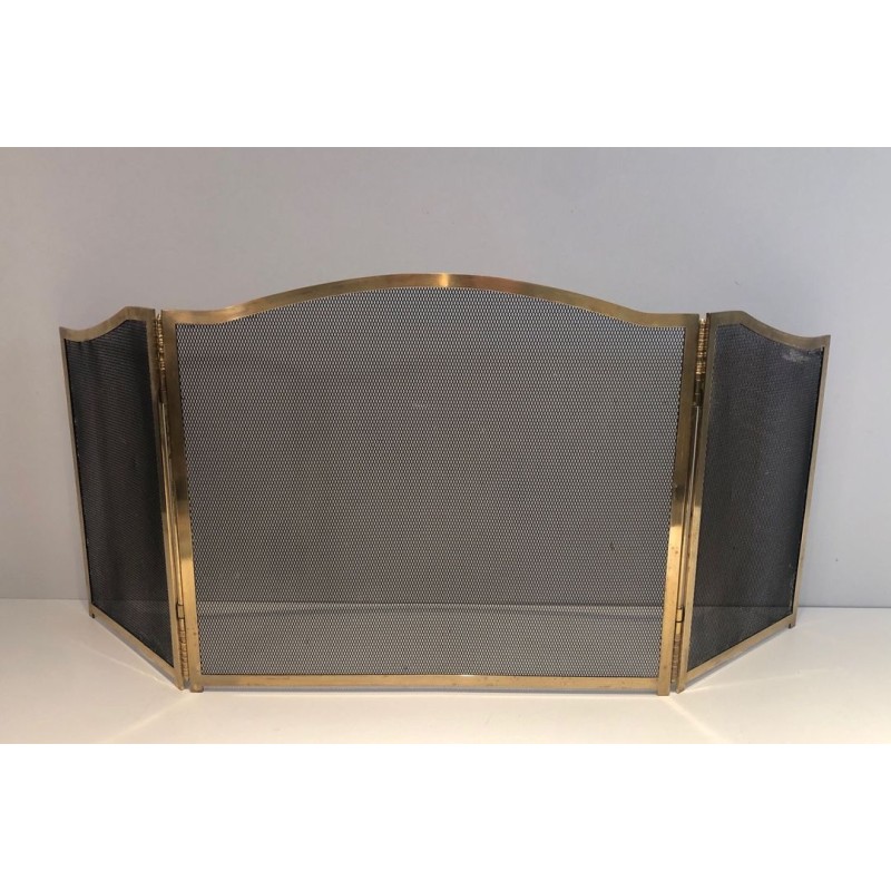 Three-Panel Neoclassical Brass and Wire Mesh Folding Fireplace Screen with Arched Centre. France. Circa 1970.